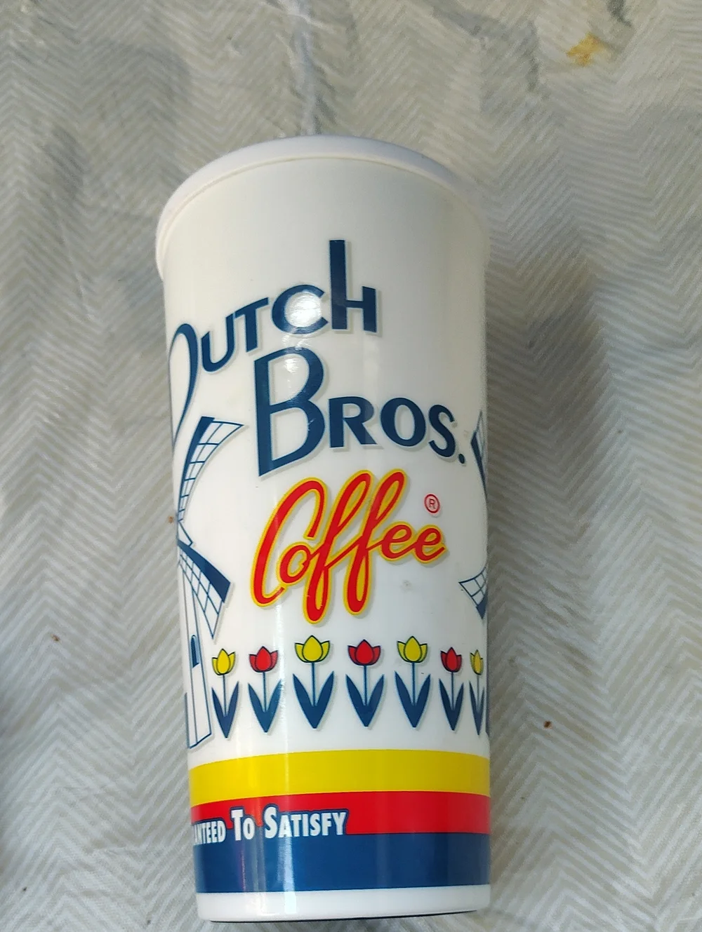 Dutch Bros White Travel Cup with Blue, Yellow & Red Accents